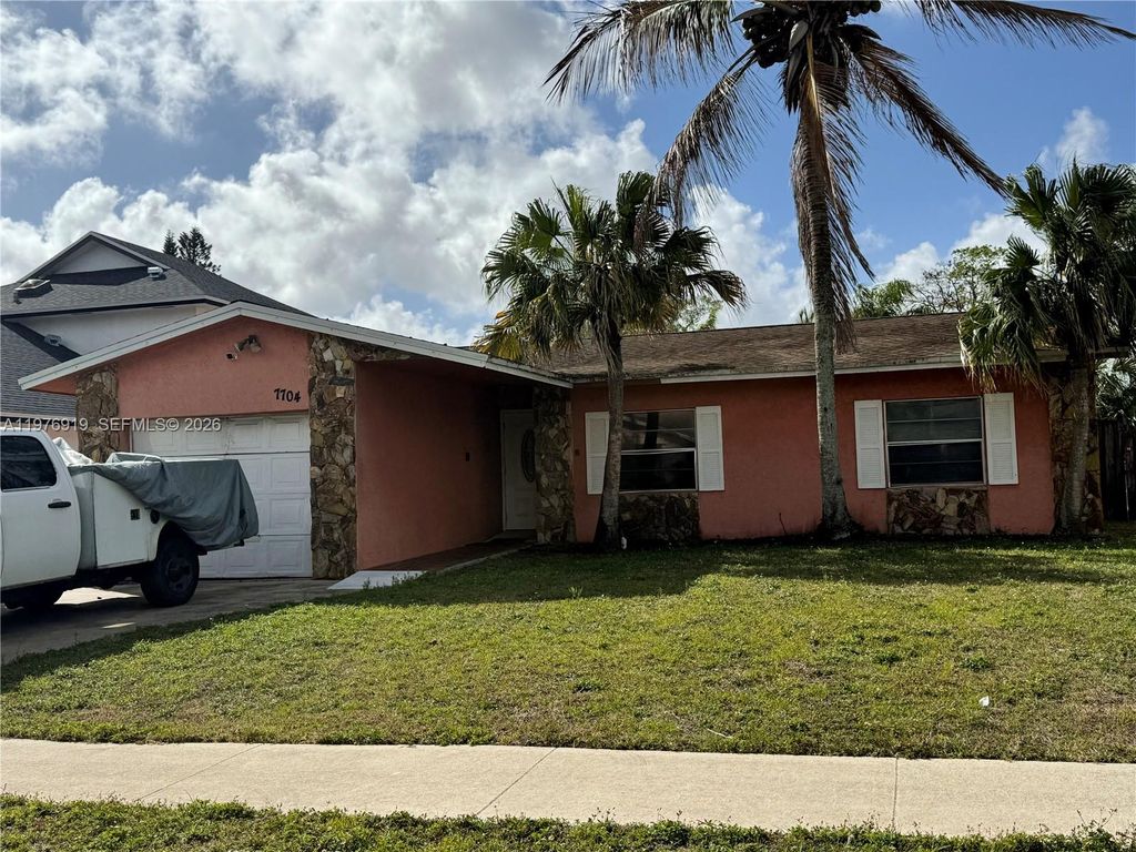 Photo of 7704 SW 8th Ct, North Lauderdale, FL 33068 (MLS # A11976919)