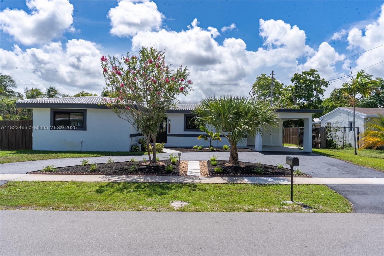 Stunningly renovated 3-bed, 2-bath corner home in sought-after Lyons Park! This light-filled gem offers an open layout, sleek kitchen with quartz island, luxury vinyl floors, and spa-style baths. Step outside to your private tropical retreat with a sparkling pool, covered patio, and spacious yard—perfect for entertaining. Impact windows throughout and a circular driveway add peace of mind and convenience. Prime location just minutes to Pompano’s vibrant new downtown, beaches, and dining. Seller credit available for rate buydown with preferred lender.
