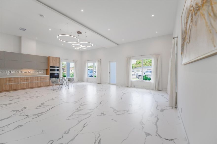 Brand-new single-family home (build end of 2024) featuring 5 spacious bedrooms, flooded with natural light and designed with modern elegance. This bright and airy residence has never been rented before and offers a thoughtfully laid-out floor plan with high ceilings, expansive living areas, and oversized windows that create a warm, welcoming atmosphere. The state-of-the-art kitchen is equipped with high-end stainless steel appliances, sleek cabinetry, and premium finishes—perfect for both everyday living and entertaining. contemporary bathrooms to the ample closet space and outdoor area. Located in a desirable neighborhood, this immaculate property offers the perfect blend of privacy, luxury, and convenience. Available now for immediate move-in