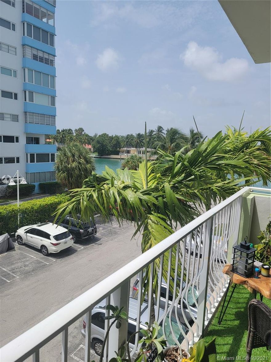 Beautiful water views from this Bay Harbor Islands oversized one-bedroom, one-bath unit at the corner of the island. Unit also has a bonus room "Den" with built-in custom cabinets and bed that are included in the sale. Amazing, well-maintained, fully renovated and secured building. Building features  waterfront pool, gym, library, game room, and indoor/outdoor social area. Low maintenance fees, including cable, internet, one parking spot, storage. Enjoy  a very spacious kitchen and living/dining area. Kitchen also has a custom made counter great for entertaining. There is plenty of closet space in the unit with  a washer/dryer combo. Parking included and extra storage outside of unit.  Great unit for investor, the unit can be rented for one-year leases immediately .