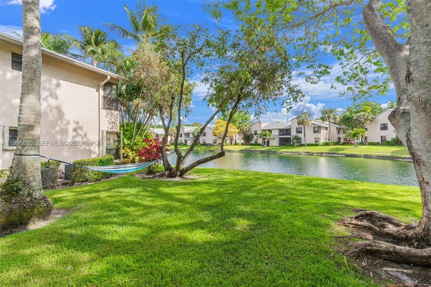 BEST ASKING PRICE for 2/2 in Karanda Village - AND- it is totally and beautifully upgraded! Step outside to a serene, view of small lake and lovely trees! Hang your hammock and enjoy the breezes with a good book! Then, step inside to a meticulously kept home w/ pool view from porch! Light and bright great room concept designed in a Southwestern motif! Nice sized rooms include a primary room w/ en-suite bath and walk-in closet! Split bedroom plan creates privacy! Screened in porch can be used in a myriad of ways including a children's playroom! Master Association with dues of only $185 quarterly offers an Olympic pool, tennis and basketball courts, game rooms, classes of every kind, a Performing Arts Center, ballrooms, athletic club, walking paths and so much more -all surrounded by a lovely 10-acre lake! Karanda Village is minutes from  The Promenade an upscale, open-air shopping w/ stores such as DSW, Chicos, and Sephora.  Eateries include The Cheesecake Factory, Cooper's Hawk and Bar Louie! The movie theatre is 11 screens w/ leather seating, a full bar and more! Motivated owner - Easy to show - Will go fast!