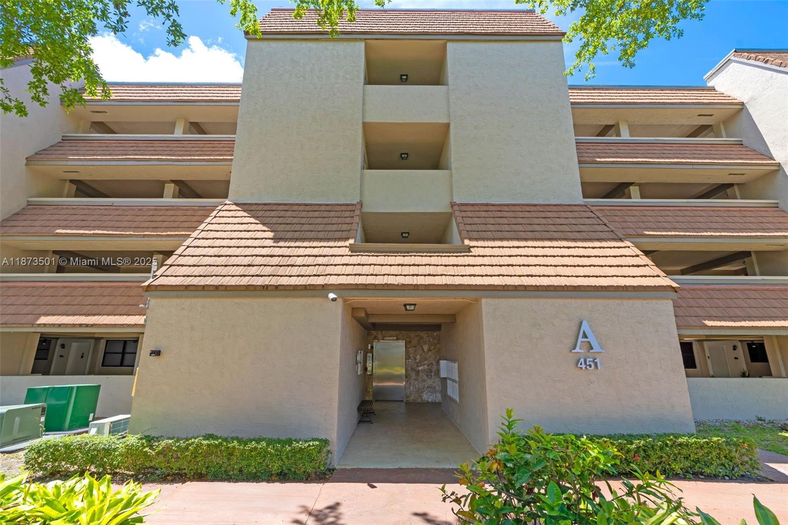 Welcome to this beautifully maintained and oversized 2/2 condo located in the highly sought-after Ives Dairy section of Miami. Step inside to find a bright and airy layout with tile flooring throughout, a large living and dining area, and an updated kitchen featuring modern appliances, ample cabinet space, and a breakfast bar. The expansive primary suite boasts a walk-in closet and a private en-suite bathroom. The second bedroom is equally spacious and ideal for guests, family, or a home office. Enjoy your morning coffee or evening breeze from the private balcony, which offers a serene view. Located in a secure, well-maintained community with a pool, clubhouse, and lush landscaping. Minutes from I-95, 441, Aventura Mall, major highways, schools, and places of worship. Come and see today!