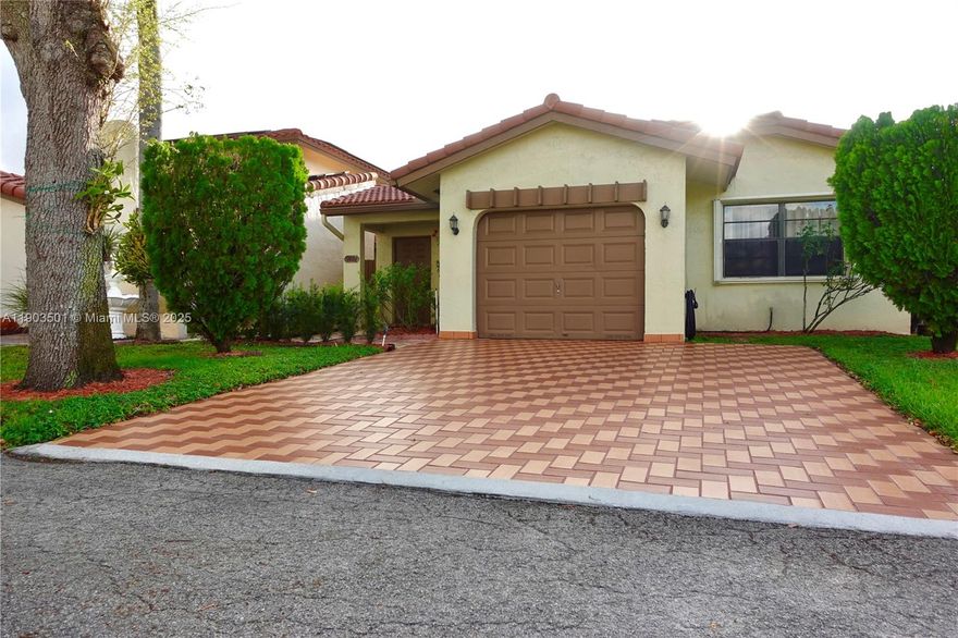 Beautifully updated townhome in a prime central location!  Quiet neighborhood just 7 miles away from I-95.  Features tile/marble floors, remodeled kitchen and bathrooms, and 250 sq ft of added living area.  Gated community with pool, gym, tennis court and clubhouse.  HOA is $291/month and includes lawn care, exterior paint, basic TV and high-speed internet. A/C 2024.  Furniture is available for sale.  Near schools, hospitals and shopping!