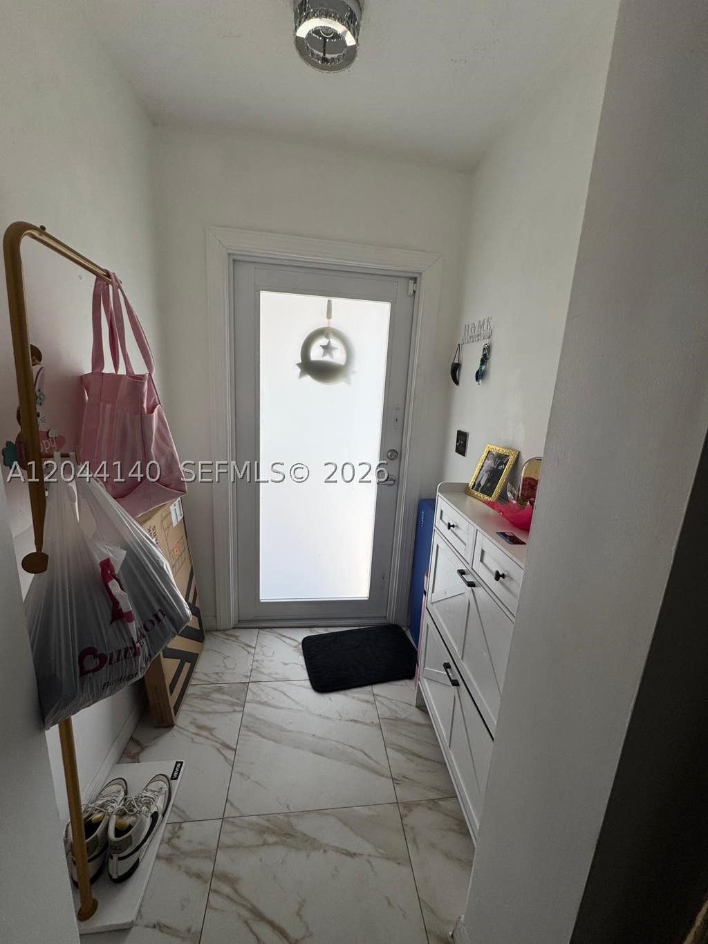 Photo of 5851-5853 Fillmore St, Hollywood, FL 33021 (MLS # A12044140)