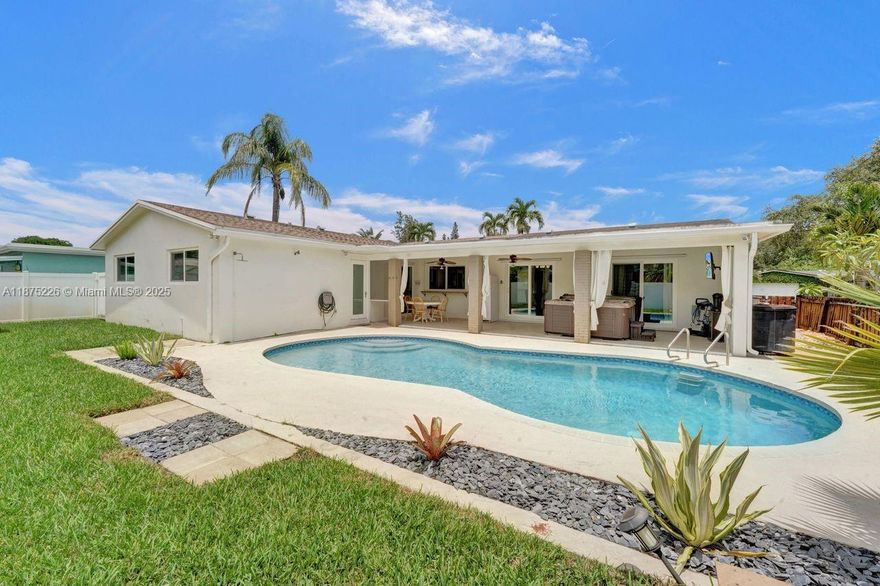 Price revised for quick sale!!!Beautiful one story pool home in highly sought after Cooper Colony Estates in Cooper City. Home shows great with 5 bedrooms and 3 baths incl. converted garage with1/1 in-law suite and office. Very nice kitchen w/ granite tops, white cabinets and stainless steel appliances. All hurricane impact windows and doors throughout. Tile flooring in main areas and wood flooring in bedrooms. Gorgeous private backyard with fully covered patio to entertain friends and family overlooking pool area. This is a great area and neighborhood with good schools.