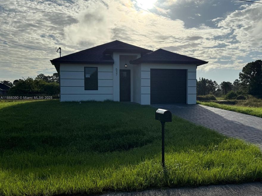 New Construction Home truly a must see ! Seller will contribute to closing cost !!! READY to MOVE IN. Beautiful 3 bedroom 2 bathroom home, located in a fast growing area in Lehigh Acres with canal. This home has an OPEN floor plan, porcelain tile floors throughout the entire home, stainless steel appliances, Impact window and doors. Beautiful white cabinets and QUARTZ counter tops. Schedule your showing today and come see this beautiful home!