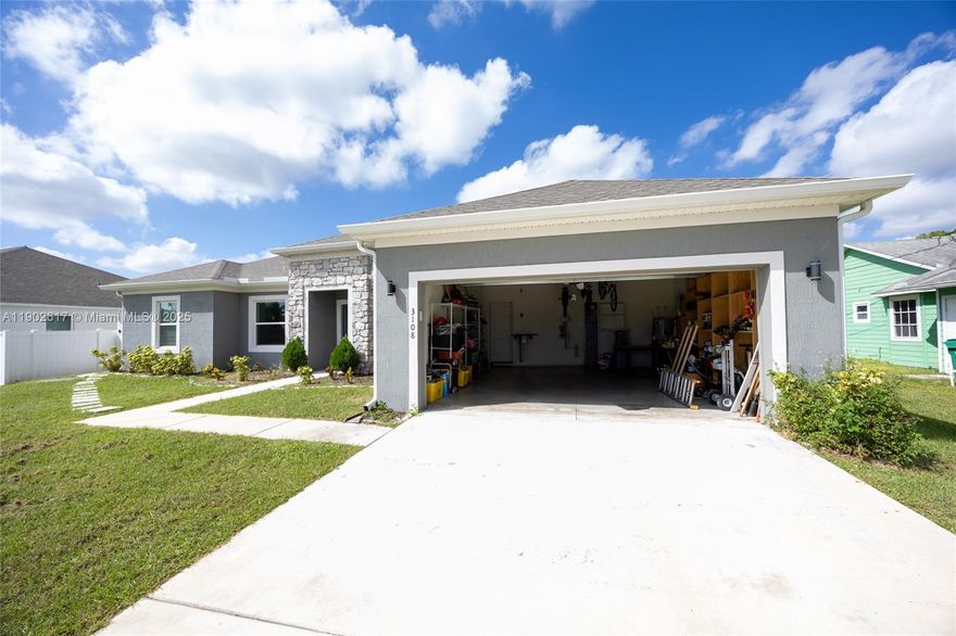 Welcome to this stunning 2022-built home in the heart of Port St. Lucie — ideal for families or investors seeking a modern, low-maintenance property. This spacious residence features 3 bedrooms, 2 full bathrooms, a versatile den that can serve as a 4th bedroom or home office, plus an efficiency unit generating approximately $900 per month in rental income. Designed with comfort and functionality in mind, the open-concept floor plan showcases perfect for entertaining and everyday living. Conveniently located near shopping, dining, I-95, and the Turnpike, this home offers the perfect blend of quality, location, and investment potential.