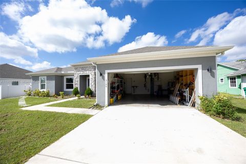 Photo of 3108 SW Nutley St, Port St Lucie, FL 34953 (MLS # A11902617) Photo of 3108 SW Nutley St, Port St Lucie, FL 34953 (MLS # A11902617)