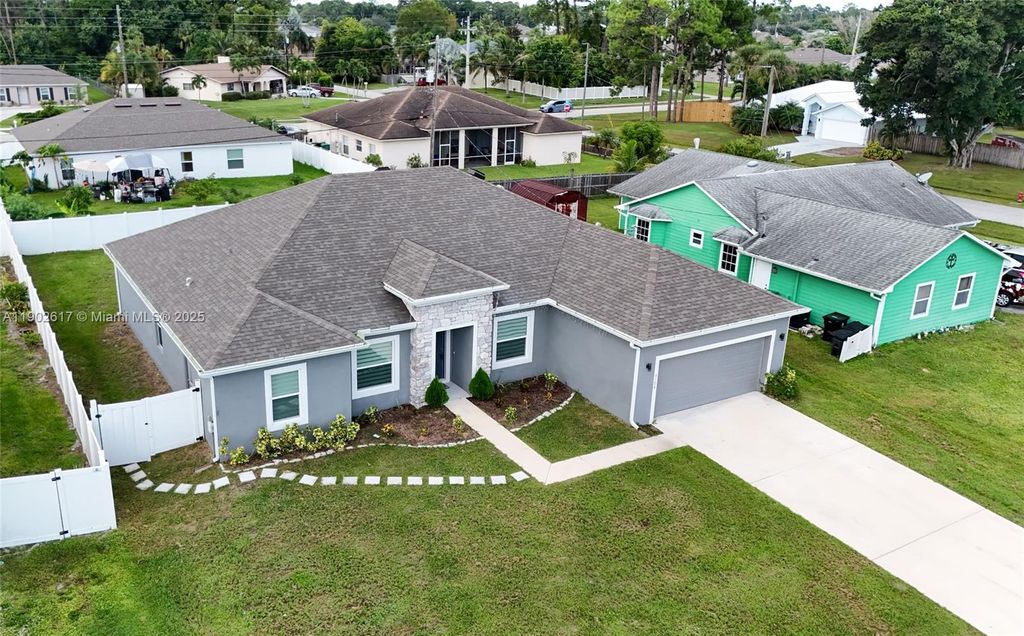 Photo of 3108 SW Nutley St, Port St Lucie, FL 34953 (MLS # A11902617)