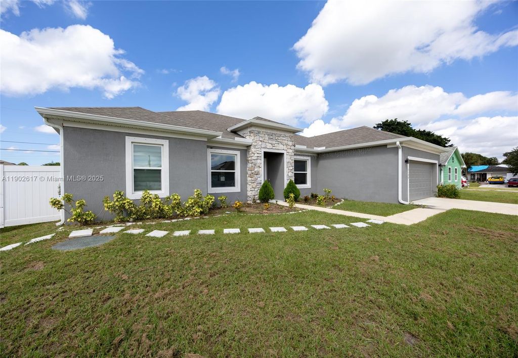 Photo of 3108 SW Nutley St, Port St Lucie, FL 34953 (MLS # A11902617)