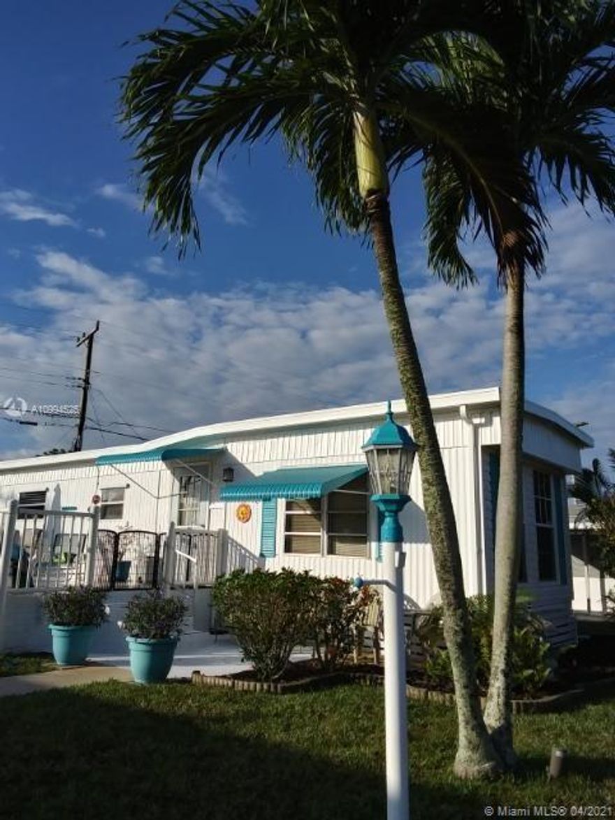 This adorable two bedroom one bathroom mobile home feel like a beach cottage, is located in the most Sought after over 55 community "Tropical Breeze Estates Inc". where are you OWN THE LAND your low monthly maintenance fee of $110.00 including lawn ,Pool ,Shuffle board, Paton court, onsite manager/ office. reserve funds and active club house that host community breakfast ,dinners, dances, karaoke, bingo and a library with free Wi-Fi . Conveniently located in the heart of Boynton Beach you are five minutes to shopping ,theaters, restaurants, and super Walmart . 6 miles to the Boynton beach inlet where you will find free parking to the most unspoiled clear turquoise water looking Sea glass and shelling fishing, swimming, snorkeling and surfing.