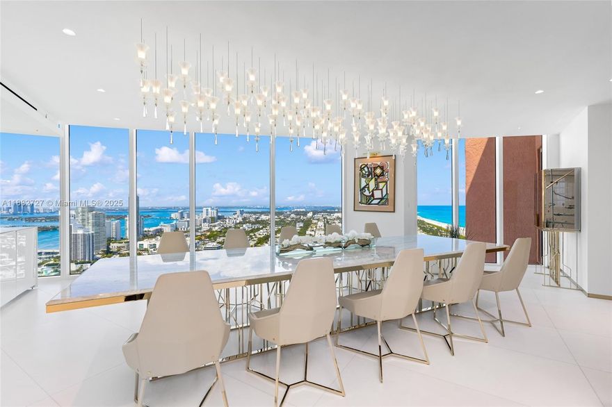 Experience the pinnacle of luxury in this tri-level penthouse atop the highly coveted Portofino Towers. This nearly 6,000 sqft estate in the sky awaits a visionary seeking the ultimate living experience. Meticulously reimagined with a $9M renovation, every detail has been elevated to perfection, including a stunning floating glass staircase. Offering 360° views of the ocean, skyline, city, and Intracoastal across 3,000 sqft of exterior space. The private rooftop, complete with a pool and observation deck, crowns this masterpiece in the heart of South of Fifth, Miami's most exclusive enclave. Designed for those who demand the extraordinary, this residence is a testament to refined opulence and sophisticated living. Seize this generational opportunity today.