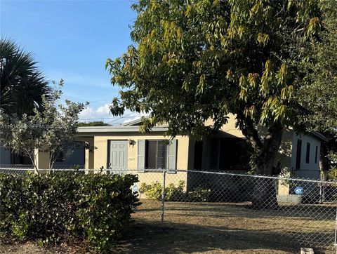 Photo of 2227 NW 9th Ct, Fort Lauderdale, FL 33311 (MLS # A11934560)