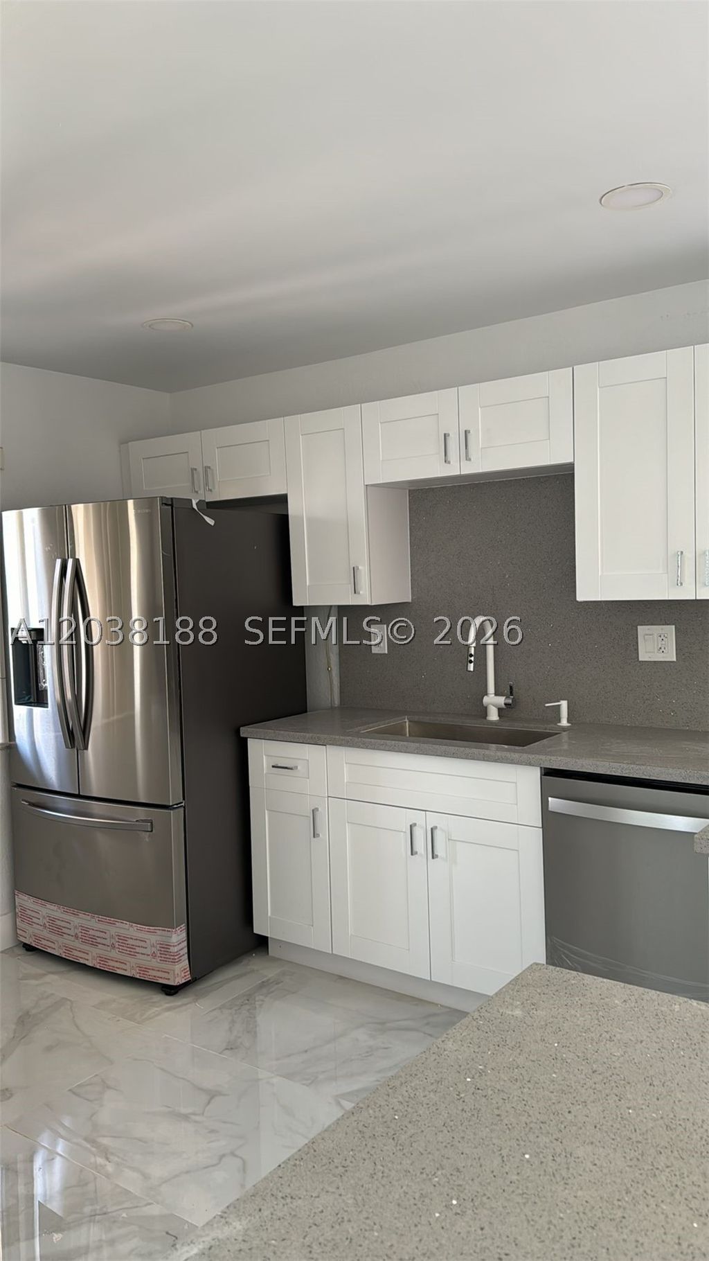 Photo of 331 Lakeview Dr #101, Weston, FL 33326 (MLS # A12038188)