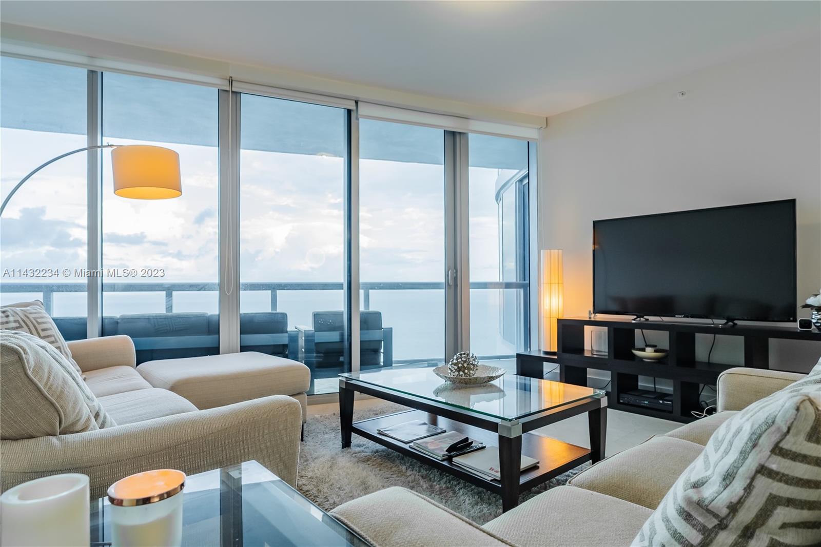 Immerse yourself in the beauty of the sunrise and sunset with a thoughtfully designed floor plan that maximizes the panoramic views. from the 40th floor. This 3 bedroom 3 and 1/2 bath in Jade Beach offers an elevated living experience.
