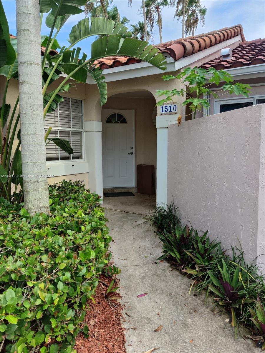 Welcome to this beautifully maintained 3-bedroom, 2 full bathroom lakefront home in the heart of Weston, FL. This home offers a spacious layout with modern finishes (including 26-inch tiles throughout), and lake views from most rooms. The kitchen features updated appliances (2024) with in-unit washer/dryer and ample storage. Step into the backyard and enjoy the beautiful lake and lush foliage from the comfort of a tiled patio and partially covered porch. You're step away from Peace Mound Park, A-rated Weston schools, Town Center, shopping and dining.