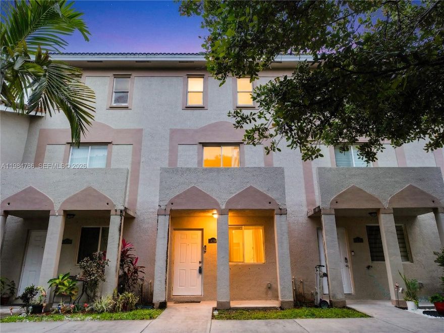 Welcome to this well-maintained three-story condo featuring 3 bedrooms and 2.5 bathrooms, ideally located in the heart of the city. This home offers a spacious living and dining area, perfect for everyday living and entertaining. The functional kitchen is equipped with stainless steel appliances and built-in cabinets, providing ample storage. A convenient half bathroom is located on the first level. The second floor includes two well-sized bedrooms and a full bathroom, while the entire third floor is dedicated to the primary suite, complete with two walk-in closets and a private en-suite bathroom. Step outside to a fully fenced yard with additional storage, ideal for relaxation or extra space. The property includes two assigned parking spaces along with ample guest parking. Situated in a quiet neighborhood with easy access to I-95, the Turnpike, and the 826 Expressway, this home combines comfort, convenience, and location. Enjoy the 3D tour. May your best start here!