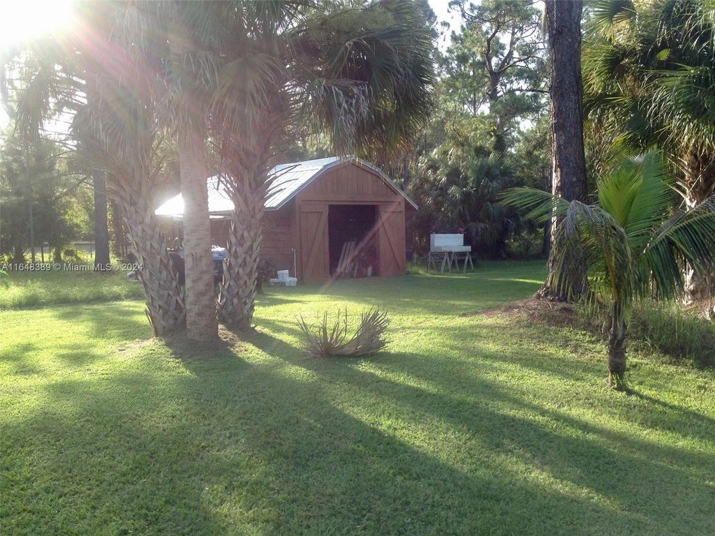 Photo of 8106 SW Citrus Blvd, Palm City, FL 34990 (MLS # A11648389)