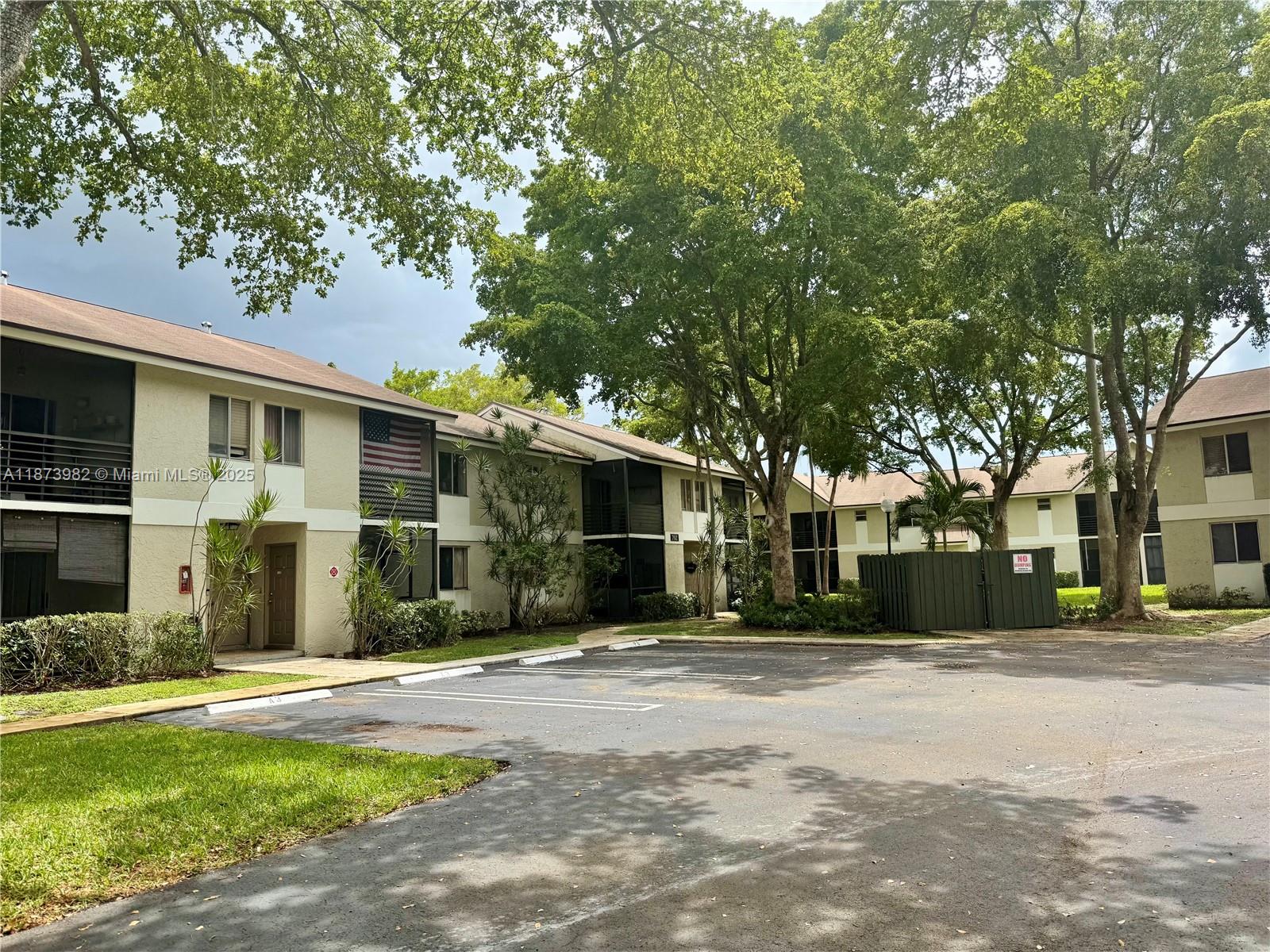 Spacious & updated 2-bedroom, 2-bathroom ground-floor unit in the highly desirable Gardens North Condominium. This move-in-ready home features fresh interior paint, new modern baseboards, and high-end appliances. The kitchen is enhanced with a sleek backsplash, combining style and practicality. Enjoy a bright and open floor plan with generously sized bedrooms, washer & dryer in unit and ample storage. Located in a well-maintained community offering resort-style amenities including a pool, clubhouse, gym, tennis courts, and more. Conveniently situated near major highways, shopping, dining, and just minutes from the beach