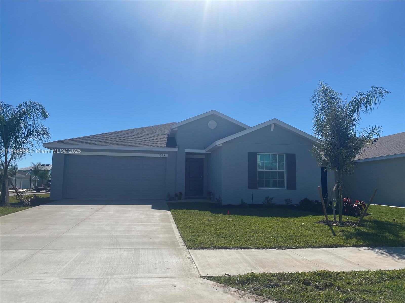Lehigh Acres Modern 4-Bedroom 2-bath home offering 1,937 sqft of stylish living on a large corner lot with a 2-car garage. Features include upgraded electrical fixtures, a smart alarm system, and an open layout filled with natural light, perfect for everyday comfort and entertaining. Located in the sought-after, community of in Savanna Lakes, this home boasts spacious bedrooms and modern finishes throughout providing flexibility for guests, a home office, or growing families.
Enjoy access to resort-style amenities like a pool, fitness center, playground, and scenic pond with walking trails ideal for strolls or picnics. Less than 2 years old, this move-in-ready home delivers the perks of new construction without the wait. Live the Florida lifestyle at its best!