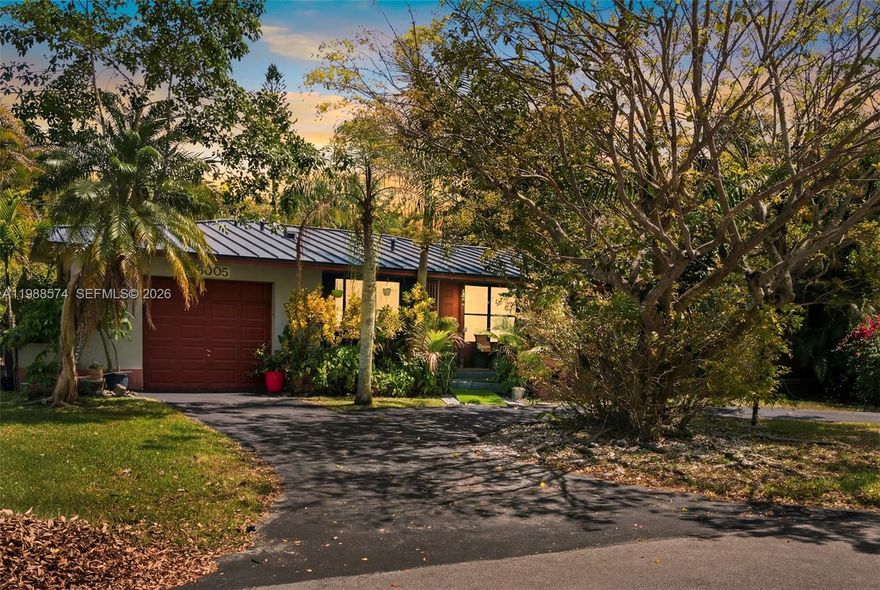 Nestled on a quiet, private street in desirable South Miami, 6005 SW 64th Place offers comfort, privacy, and thoughtful upgrades throughout. This 3-bedroom, 2-bath residence features 2,418 square feet of living area, plus a separate office that could easily be converted into a 4th bedroom, providing added flexibility for guests, family, or working from home.

The home is enhanced with valuable improvements including a metal roof, impact windows, and solar panels for added efficiency, durability, and peace of mind. Inside and out, the property is designed for both everyday living and entertaining, with jacuzzi connections already in place and a private backyard framed by palm trees that create a tranquil, tropical setting.

Additional highlights include a 1-car garage and a layout that combines function with comfort in a highly sought-after location. Adding to its appeal, the property is located near highly regarded schools, including South Miami K-8 Center’s Expressive Arts Magnet program and South Miami Senior High’s Magnet School for the Arts.