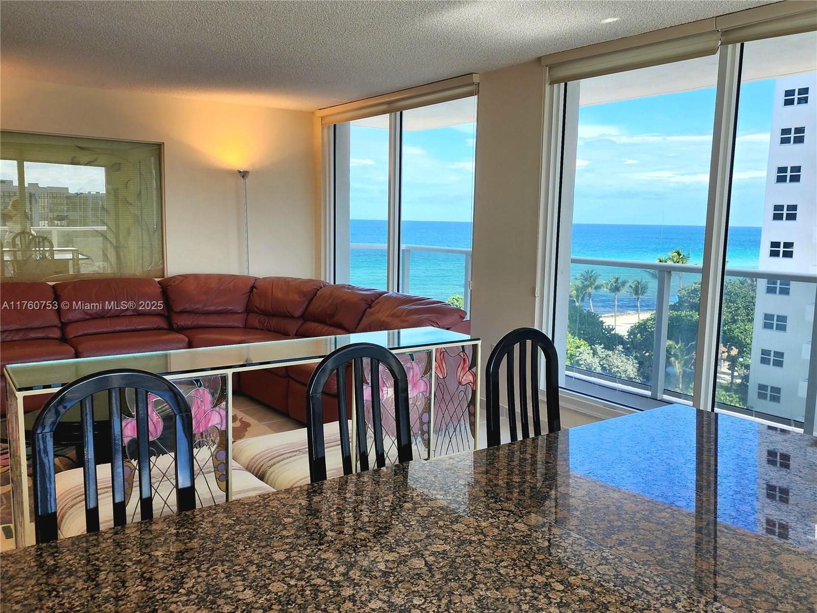 Discover the ultimate in coastal living with this spacious 2-bedroom, 2.5-bath oceanside residence, with large master suite and living-dining areas. Wake up each day to ocean views that create a true sense of peace and relaxation. The open, light-filled living spaces flow effortlessly onto a private wrap-around balcony perfect for unwinding with evening breezes. Set within a resort-style community, residents enjoy world-class amenities including two sparkling pools, a fully equipped fitness center, private beach access, pool/beach service, and 24/7 security for complete peace of mind. Just moments from premier shopping, fine dining, and vibrant entertainment. This is more than a home—it’s a lifestyle.