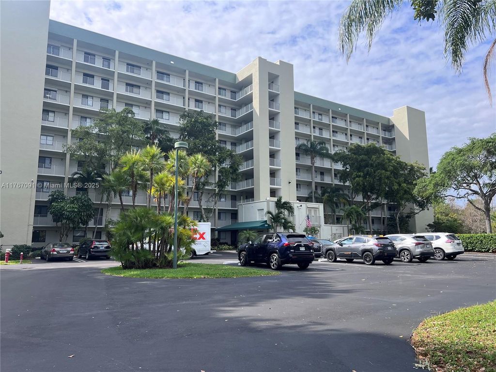 Photo of 2240 N Cypress Bend Dr #506, Pompano Beach, FL 33069 (MLS # A11767091)