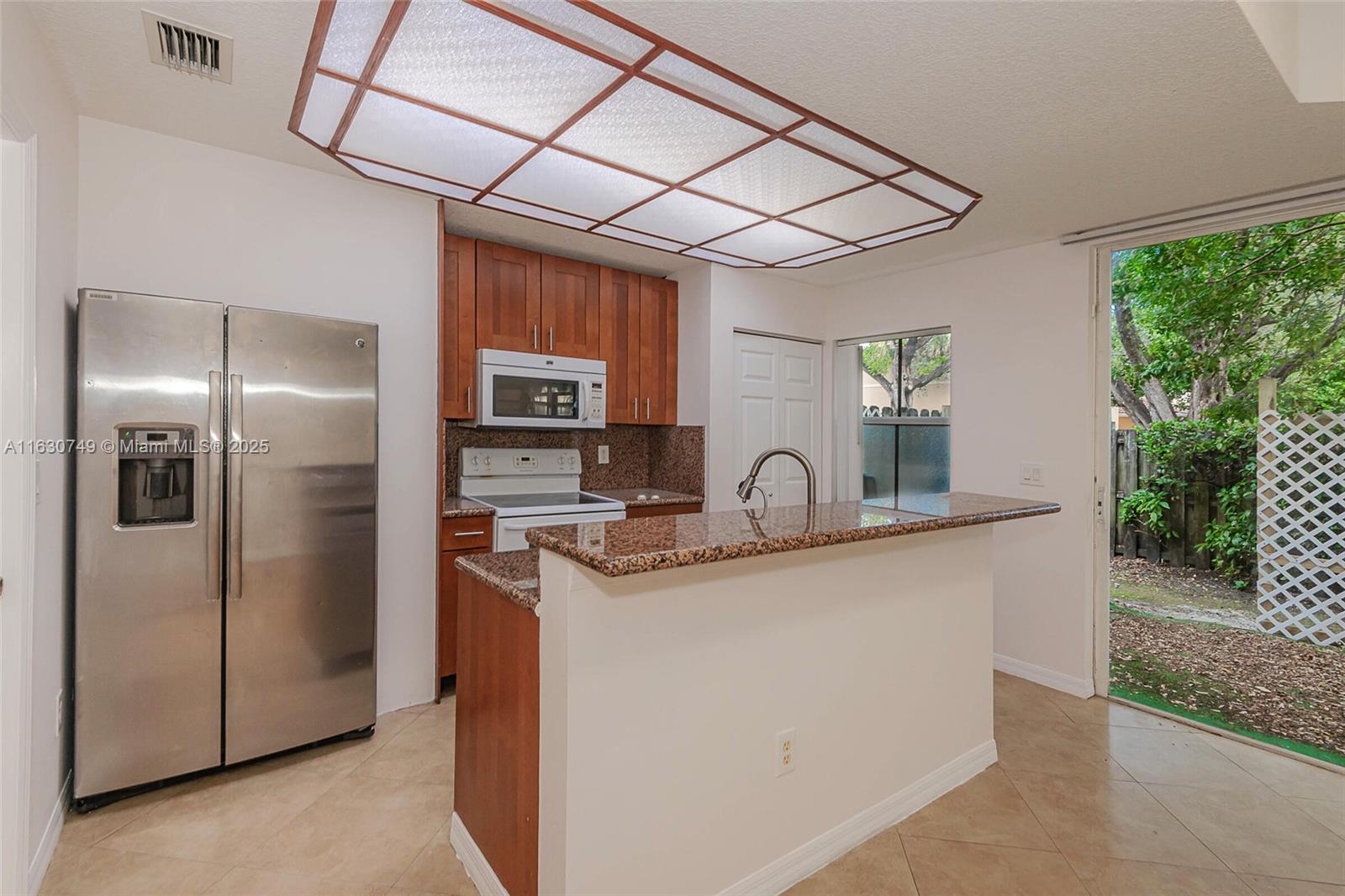 Spacious Townhouse in a gated community of Cocoplum. Mediterranean style complex. 2 story townhouse with large floor plan has: 3 bedrooms, 2.5 bathrooms. Separate laundry room with full size washer dryer. Grill and relax on your spacious patio!
Amenities include: pool, club house, gated entry, assigned parking and lush landscaping, great location, pet friendly community, minutes from Seminole Hard Rock casino and the beach’s.
Live just minutes from the beach as well as shopping and restaurants! Airport is less than 10 minutes and near the new Hard Rock