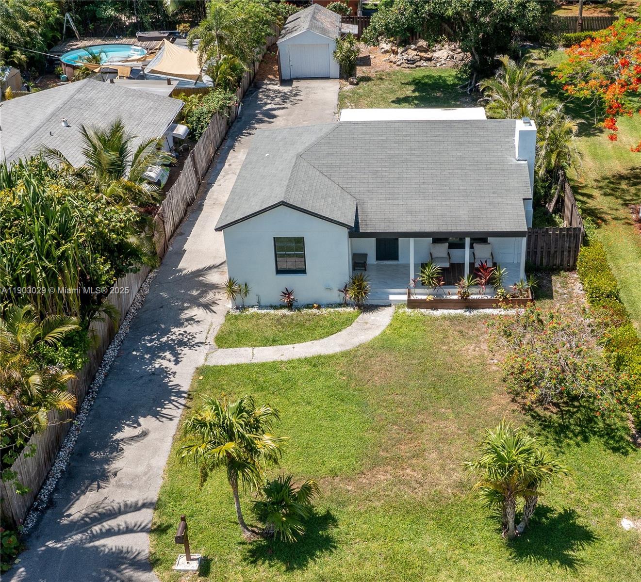 Prime buildable lot with existing home just a few blocks from Atlantic Avenue and the beach. Builders, investors, and rehabbers, don't miss this rare opportunity in one of Delray Beach's most desirable locations! This 50' x 125' (6,250 sq ft) fenced lot is buildable and comes with a survey available, offering endless potential for redevelopment or renovation. The property currently features a 3-bedroom + extra room, 2-bathroom home, making it an ideal canvas for your vision. With impact windows installed providing a solid foundation for your next project. Nestled just a short bike ride from vibrant Atlantic Avenue and beautiful beaches, you'll enjoy easy access to top-rated restaurants, boutique shopping, entertainment, and more.
