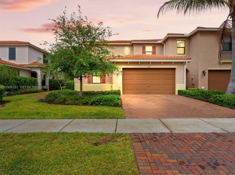Photo of 10105 Brickhill Dr, Boca Raton, FL 33428 (MLS # A12004331)