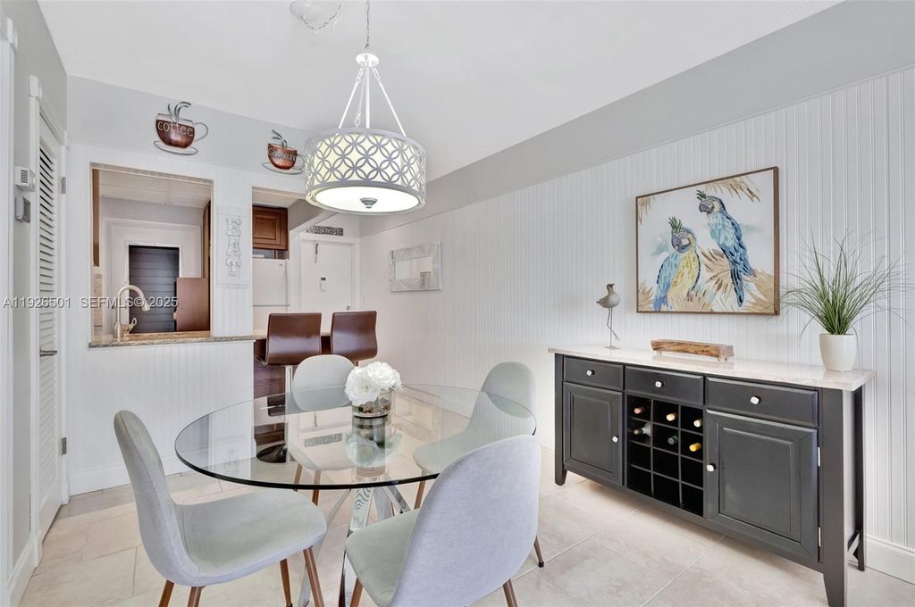 Photo of 300 Golden Isles Dr #204, Hallandale Beach, FL 33009 (MLS # A11926501)