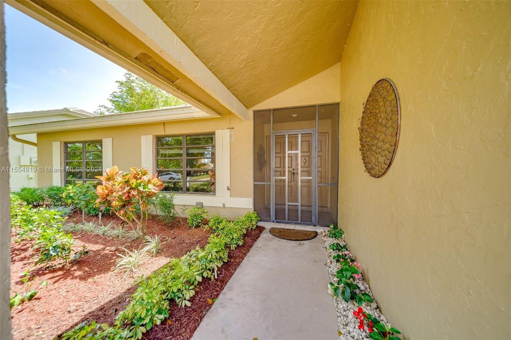 Photo of 6022 Petaluma Dr, Boca Raton, FL 33433 (MLS # A11554819)