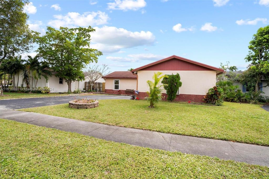 Photo of 10980 NW 28th St, Sunrise, FL 33322 (MLS # A11515860)