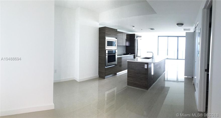 Breathtaking views from this beautiful large 2 bedrooms/2 baths with top of the line upgrades. Private elevator entrance. Amenities include club room, gym, spa, bayfront pool, rooftop tennis, movie theater, billiard room. Central location with easy access to Downtown, Midtown, Wynwood, Design District, and Miami Beach.