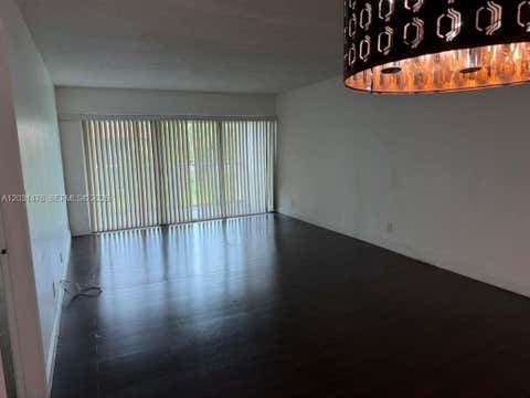 Photo of 140 Lakeview Dr #211, Weston, FL 33326 (MLS # A12031476)