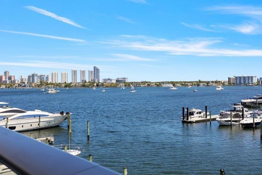 This 2-bed, 3-bath apartment offers style and comfort with panoramic Marine views.
The spacious balcony, accessible from the living room, master suite, and guest bedroom, is perfect for sunrises and sunsets.