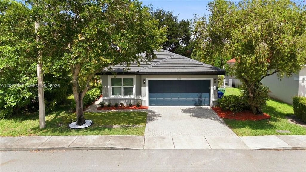 Photo of 2181 NW 162nd Ter, Pembroke Pines, FL 33028 (MLS # A12023839)