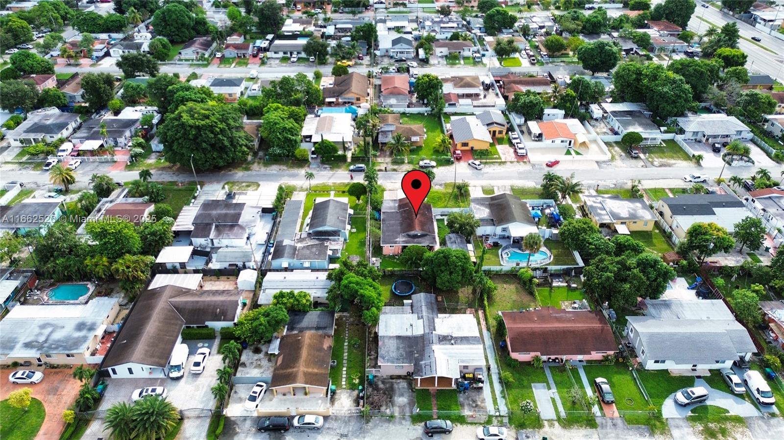 Beautiful single family home, 4 bedrooms / 2 Bathrooms, well maintained, Laminated floor throughout, new doors and impact windows, new gutters. Covered Terrace. Detached Laundry room which could be used as in-law quarters. Nice garden. Excellent location, close to LeJeune Rd, Hialeah, Miami Dade College and more. Quiet neighborhood. NO HOA