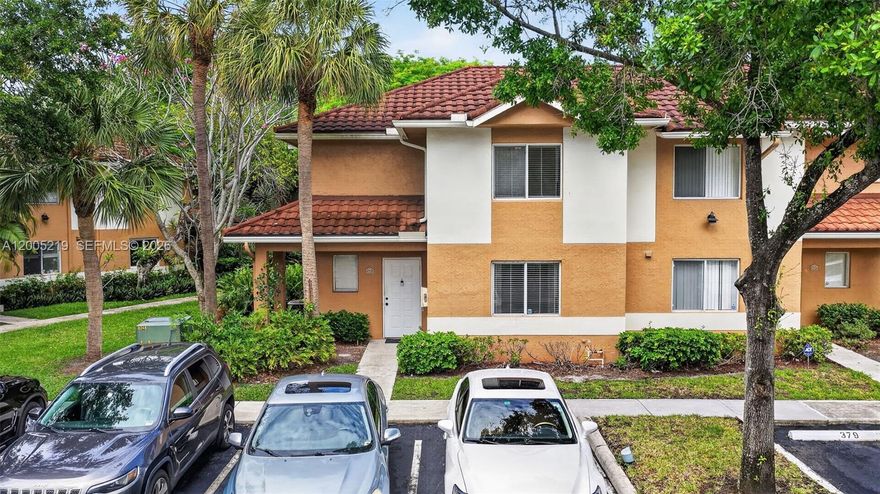 Beautiful 3BR/2.5BA townhome located directly accross from highly desirable Central Park in Plantation. Can be rented immediately! This spacious home features tile flooring, an updated kitchen. All three large bedrooms are located on the 2nd level and offer generous closet space. Enjoy a private porch looking to the beautiful garden. In unit washer and dryer. 2 parking space + plenty of guest parking.  Community ammenites include tennis, pool and gym. Pet friendly neighborhood. Close to shopping, colleges, restaurants and airport. Cash or conventional- Assoc has full reserves. No assessments, no min credit score. HOA Fees includes water and roof repairs!
