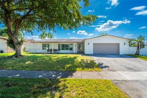 Photo of 2130 NW 106th Ave, Pembroke Pines, FL 33026 (MLS # A12058811)