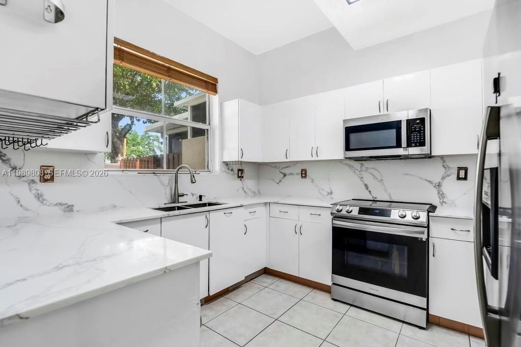 Photo of 102 Riverwalk Cir, Sunrise, FL 33326 (MLS # A11989808)