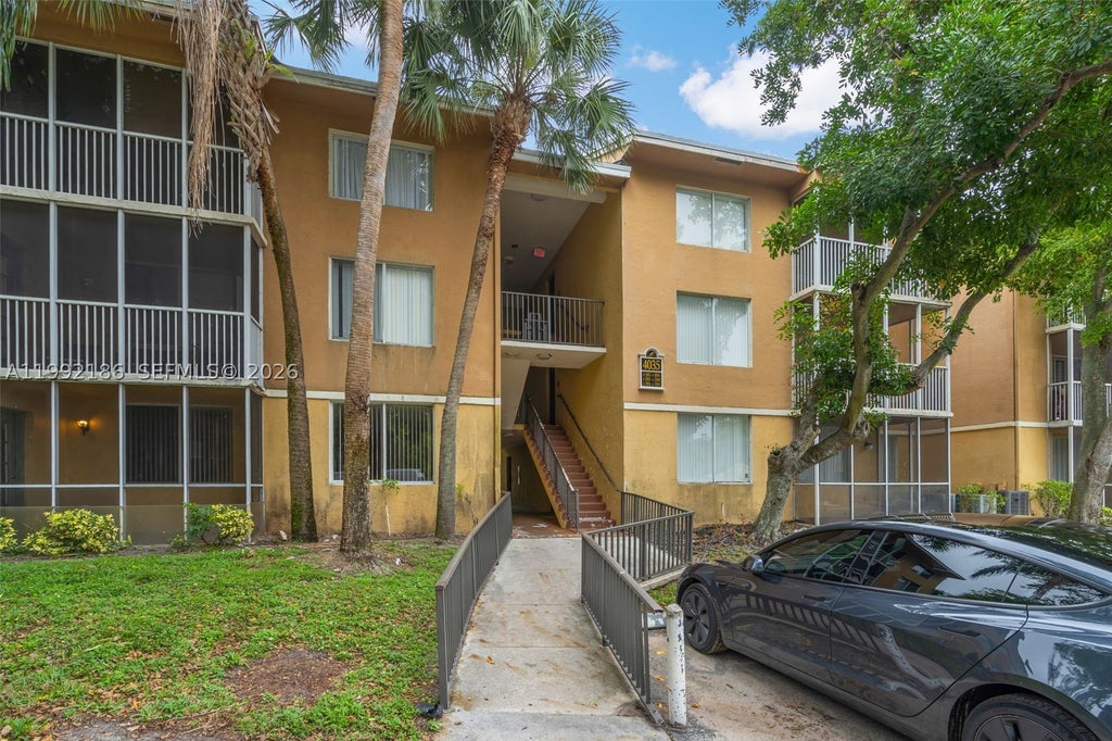 Photo of 4035 W Mcnab Rd #F101, Pompano Beach, FL 33069 (MLS # A11992186)