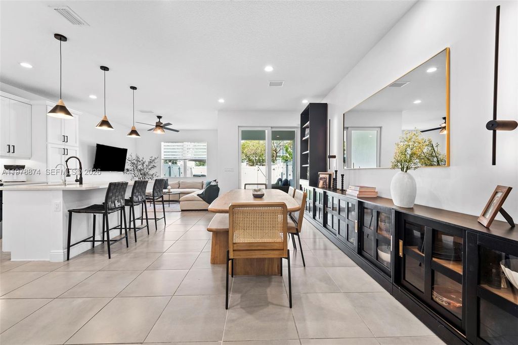 Photo of 1855 Spoonbill Ct, Deerfield Beach, FL 33442 (MLS # A11978874)