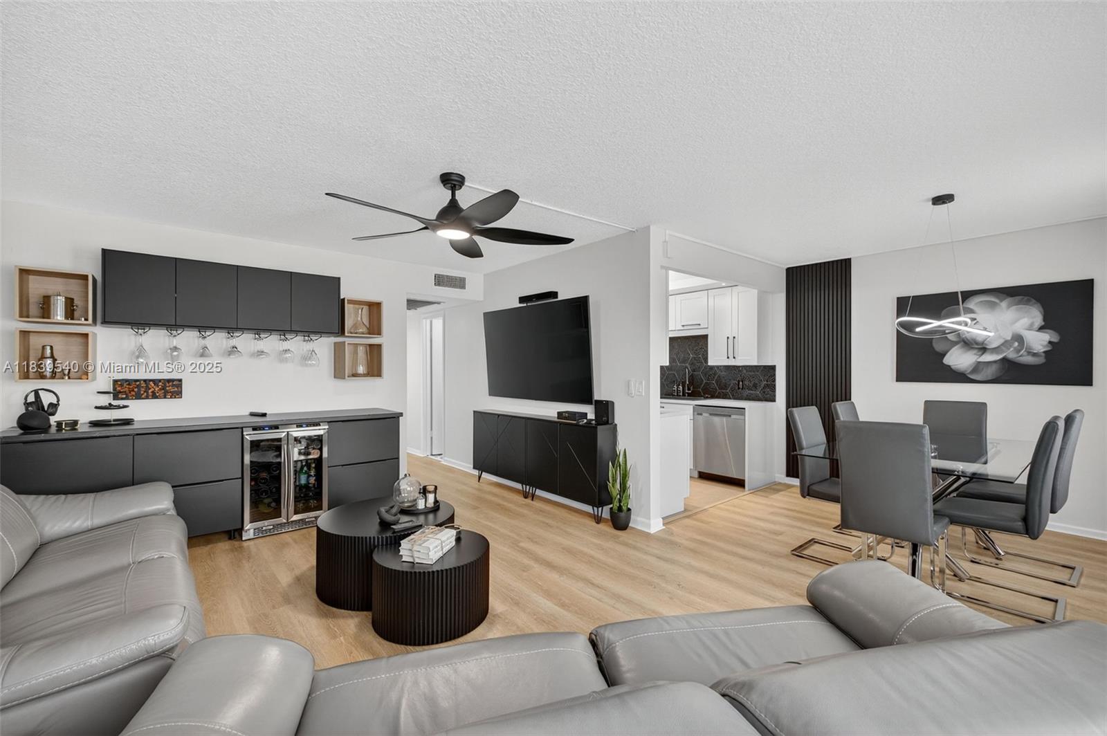 Wow! Completely remodeled with permits! This stunning, modern 2-bedroom, 1.5-bath unit offers breathtaking lake views in Deerfield’s Century Village. The gorgeous kitchen features white cabinets, quartz waterfall countertops, stainless steel appliances, & recessed lighting. Enjoy knockdown ceilings, waterproof/sunproof vinyl flooring & tile in the beautifully updated bathrooms. Relax on the large screened balcony with serene water views (roller-shutters). Move-in ready & offered fully furnished & tastefully decorated! Conveniently located next to the free laundry room. Rentable after 1 year! HOPA-verified community with clubhouse, theater, art studios, billiards, fitness center, pickleball, tennis, heated pools, 24/7 security, & a courtesy shuttle—just 4 miles from the beach