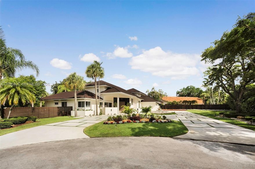 A beautifully upgraded waterfront residence in the guard-patrolled community of Galloway Glen, set on a 23,133 SF cul-de-sac lot with serene canal views. This elegant two-story home offers 6 bedrooms and 5.5 bathrooms, with soaring ceilings, abundant natural light, and a seamless blend of marble and newly installed porcelain flooring throughout, including the staircase and bedrooms. The renovated primary suite features a spa-like bath and custom closets completed in 2025. The kitchen is appointed with wood cabinetry, granite countertops, stainless steel appliances, and a dedicated coffee station, flowing into a spacious family room with wet bar and striking tongue-and-groove ceilings. Outdoor living is enhanced by a saltwater pool, expansive covered Saturnia marble patio, and a gazebo with BBQ. Additional features include impact windows and doors, plantation shutters, generator, multiple A/C systems, and a 2-car garage. Per appraisal, larger than tax roll.