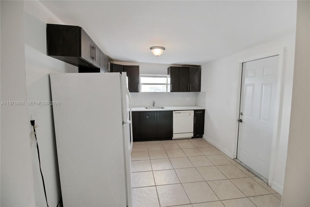 Photo of 1160 W 26th Ct #C, Riviera Beach, FL 33404 (MLS # A11975808)