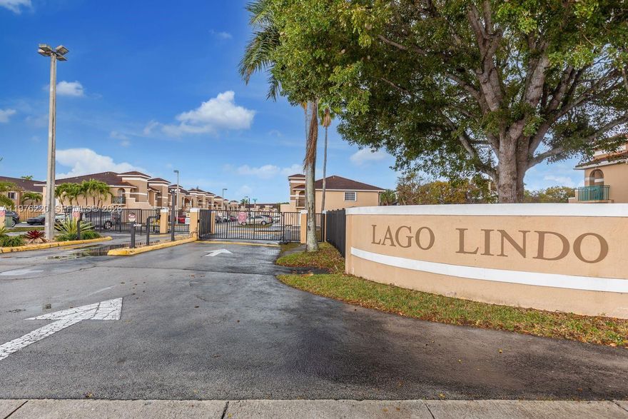 Beautifully renovated first-floor 2-bedroom, 2-bath residence with lake views. The unit has been completely updated and features impact windows and doors, along with motorized zebra blinds throughout.  TWO parking spaces.WASHER AND DYER INSIDE.