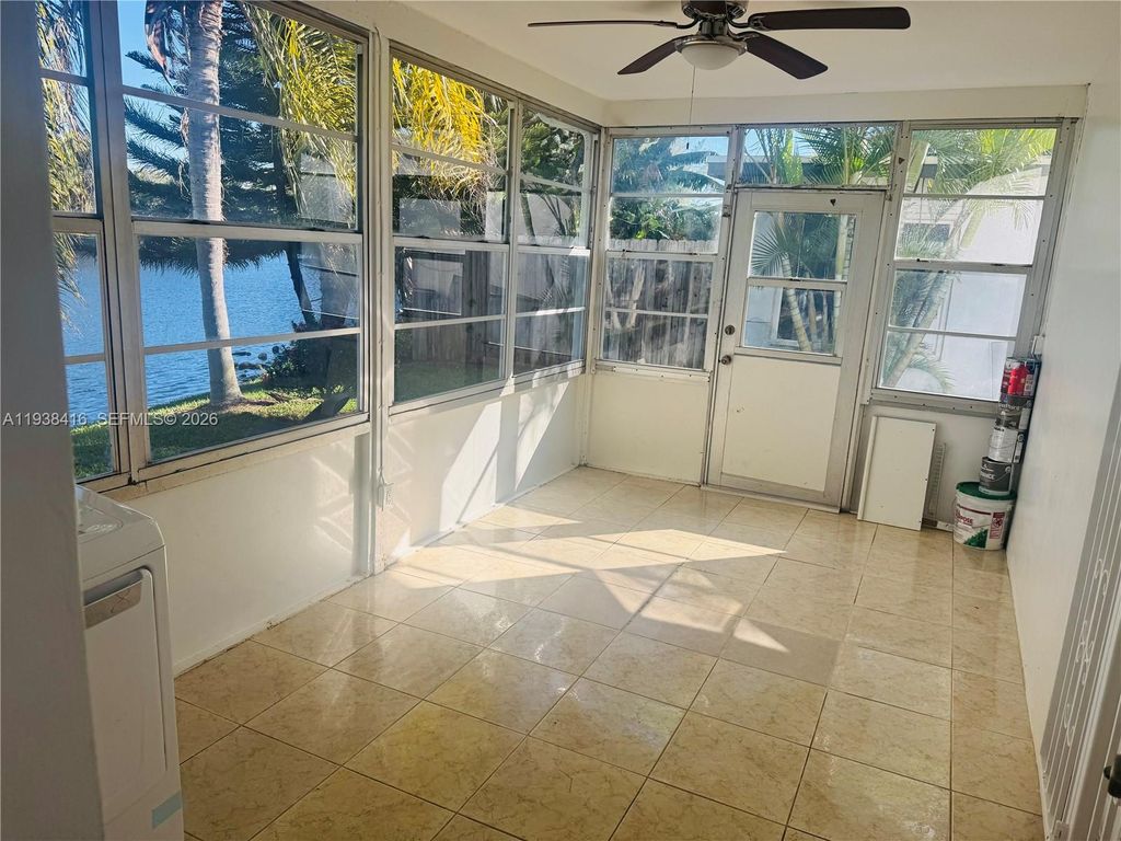 Photo of 1869 NW 45th Ct, Tamarac, FL 33309 (MLS # A11938416)