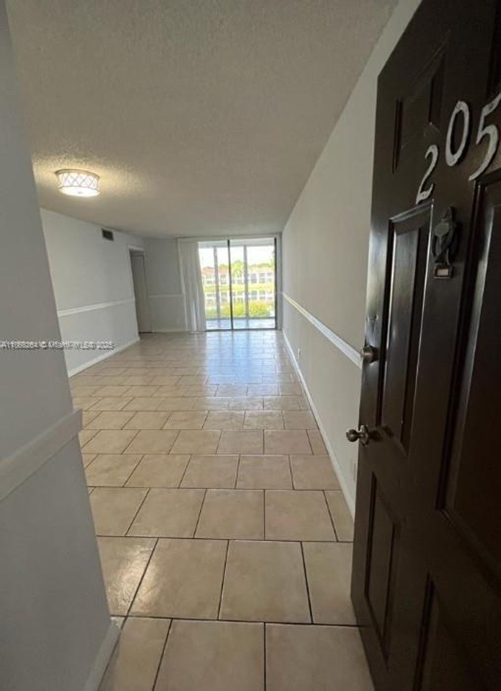 Photo of 212 Lake Pointe Dr #205, Oakland Park, FL 33309 (MLS # A11868264)