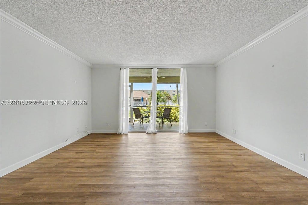 Photo of 414 SE 10th St #103, Dania Beach, FL 33004 (MLS # A12085722)